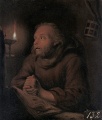 Betender Mönch bei Kerzenschein.jpg