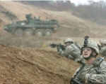 750px-US Army soldiers during maneuver practice.jpg